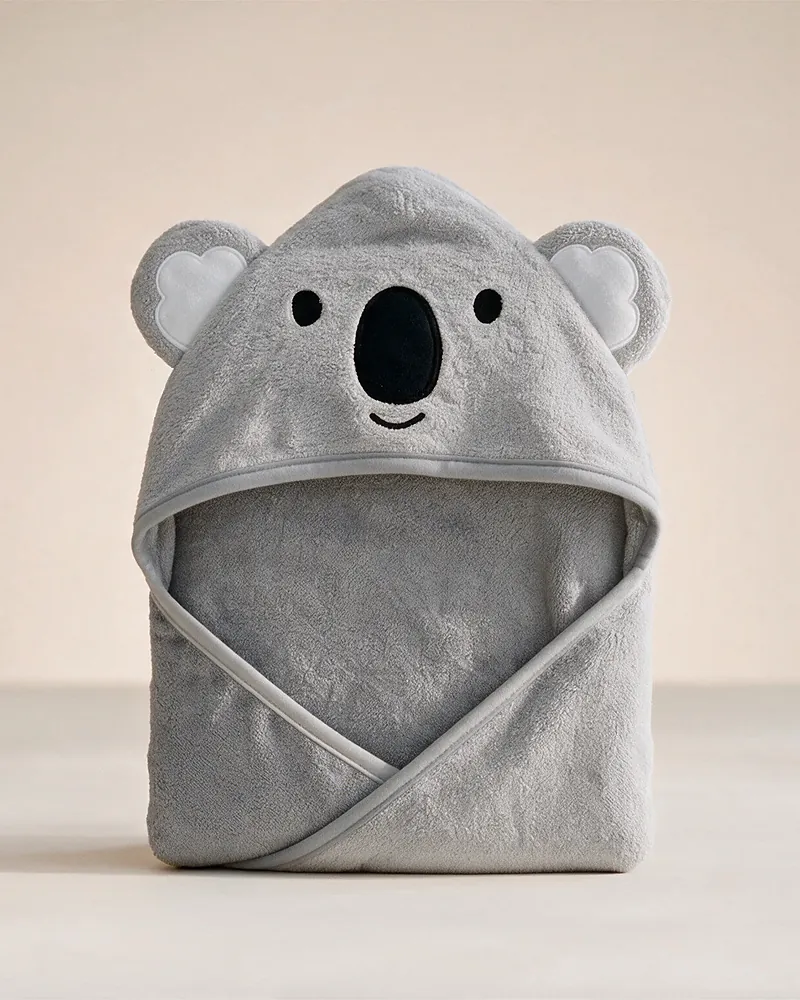 Der Koala: graues MiniBoo-Kapuzenhandtuch mit offenen Augen und schwarzer Nase